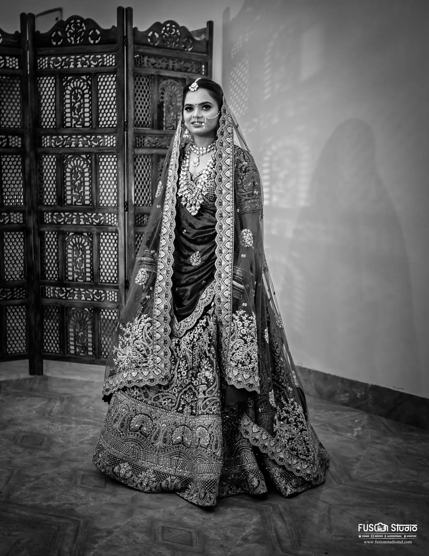 Elegant bridal attire in traditional style.